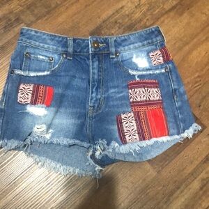 Bullhead distressed patch blue jean shorts